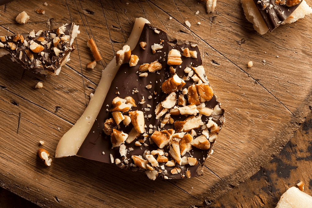 	•	Half pound of chocolate toffee 	•	½ lb tin of gourmet chocolate toffee 	•	Handcrafted chocolate toffee in small gift tin 	•	Buttery chocolate toffee pieces half pound 	•	Toffee House Sweets ½ lb chocolate toffee 	•	Premium chocolate-covered toffee half